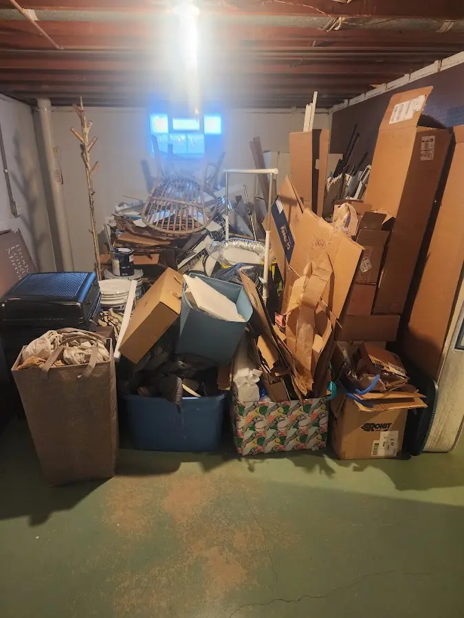 Roll-off dumpster container at job site for 2 Yard Dumpster Rental in Uxbridge